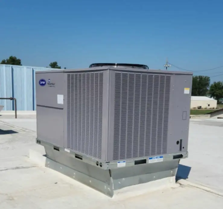 Packaged rooftop heating and air conditioning unit on a commercial flat roof